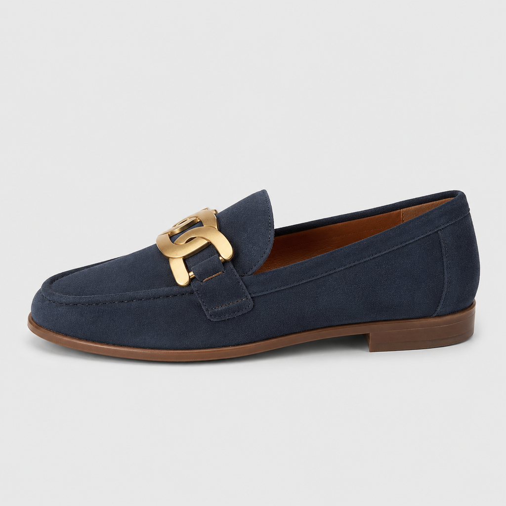Side view of women's navy chain loafers