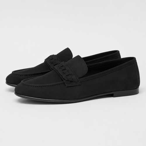 Side view of women's black woven detail loafers