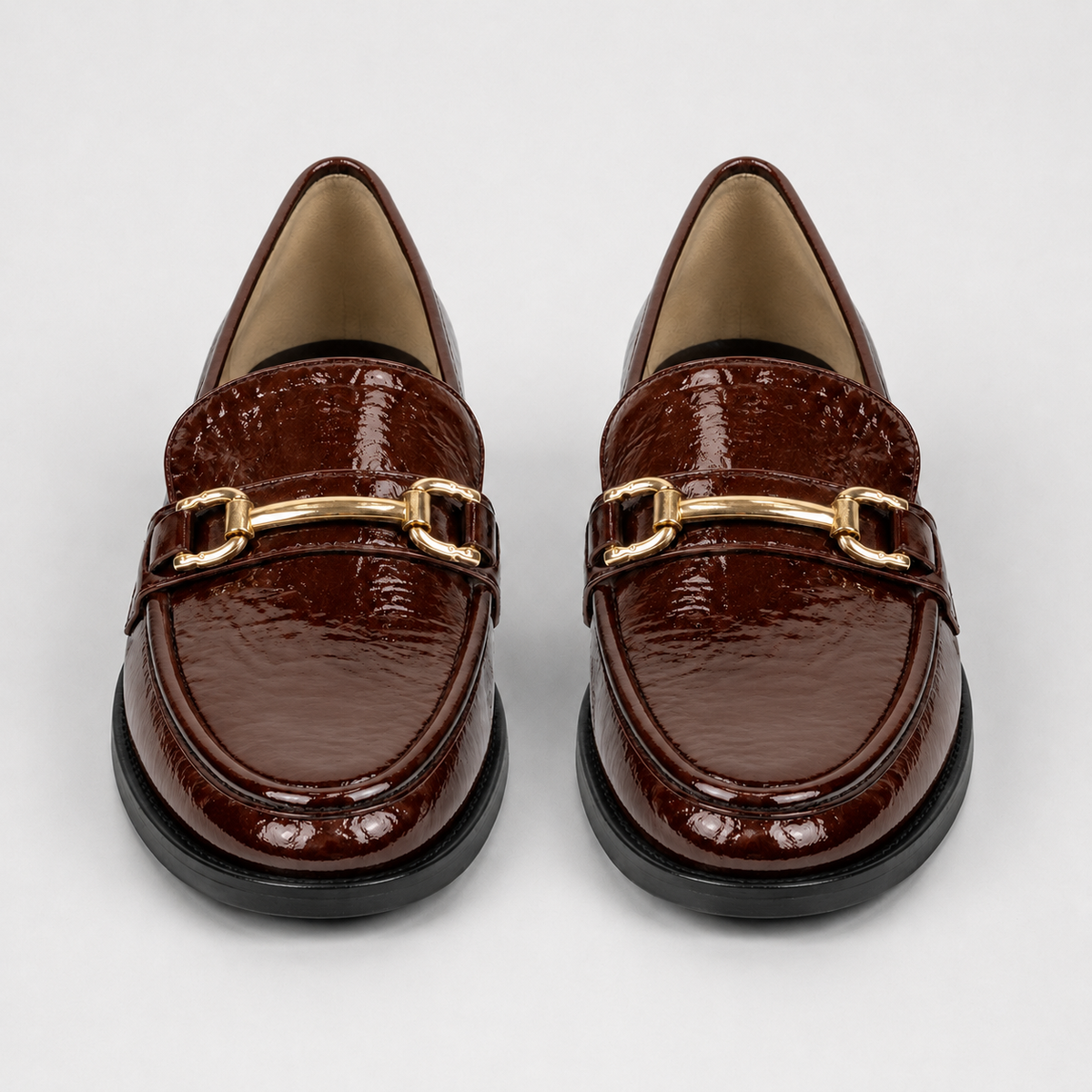 Women's brown patent horsebit loafers with gold-tone hardware