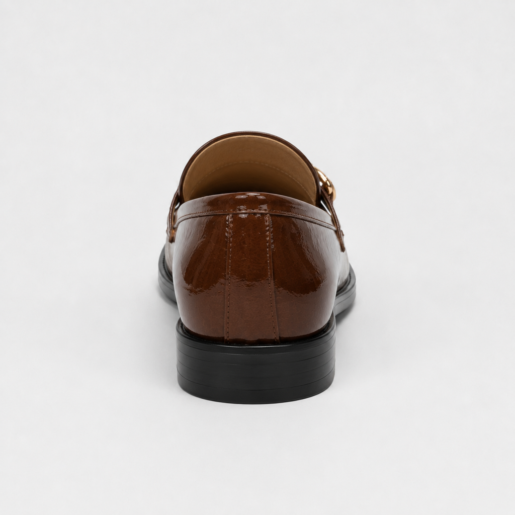 Back view of women's brown patent loafers