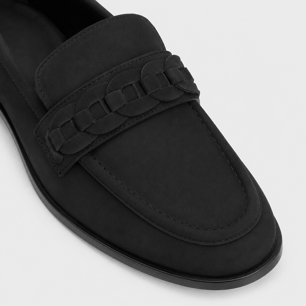 Woven vamp detail on women's black loafers