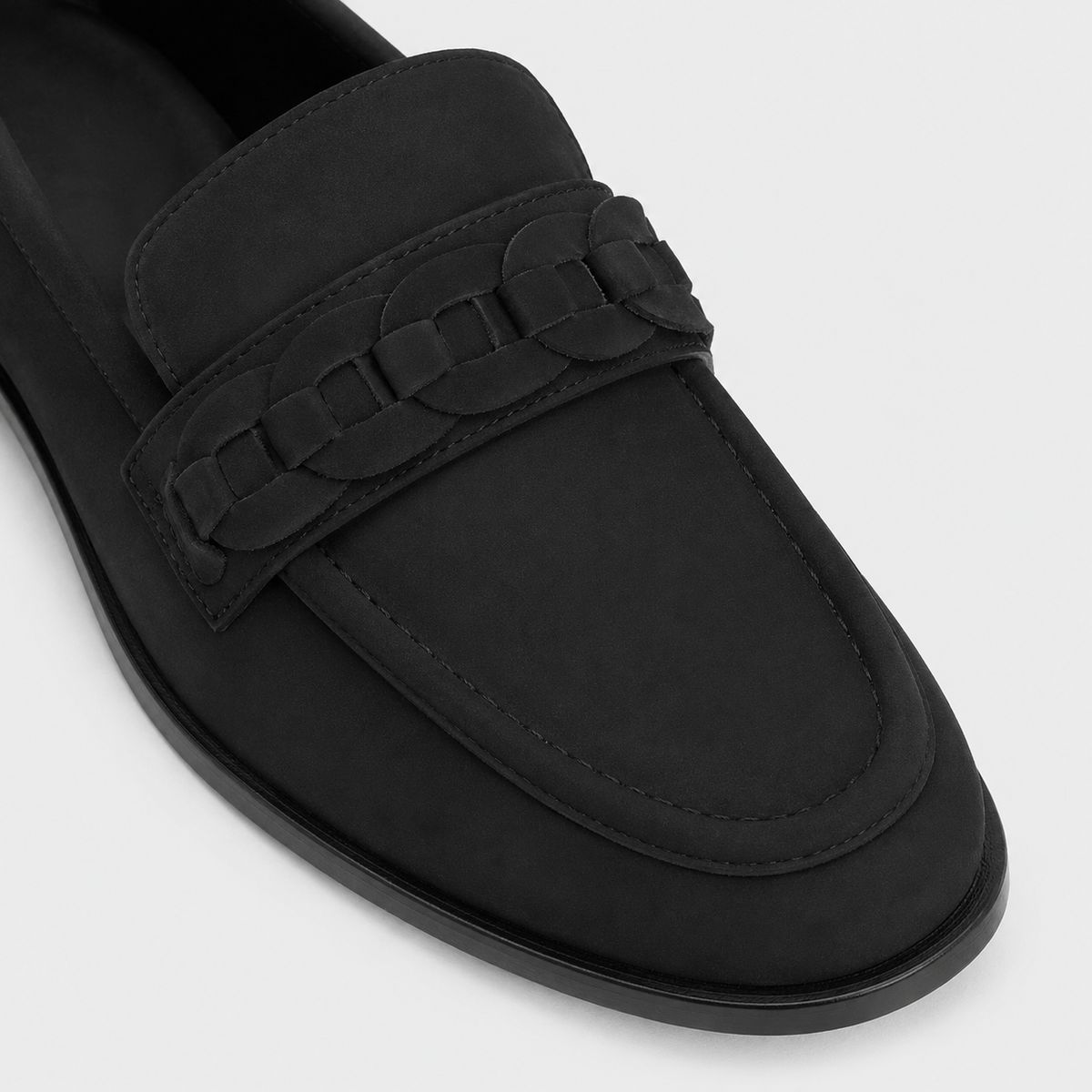 Woven vamp detail on women's black loafers