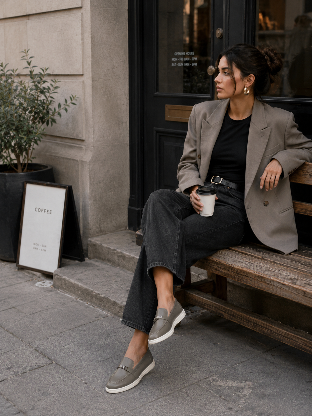Women's taupe loafers styled with jeans