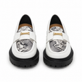 Women's white snakeskin platform loafers with black chunky sole, front view