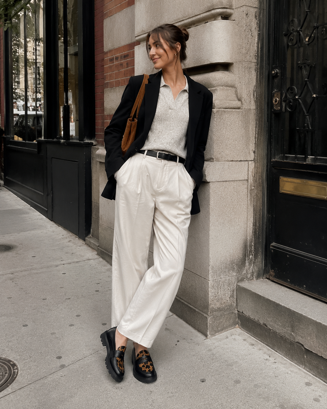 Black leopard platform loafers styled with trousers for an everyday look