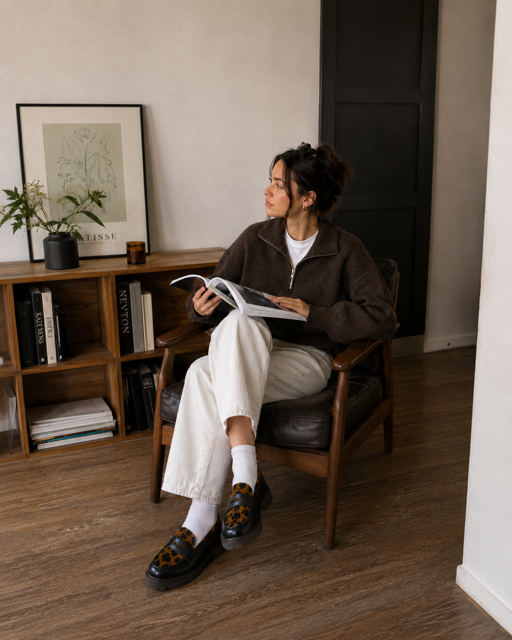 Black leopard platform loafers styled with trousers for an everyday look