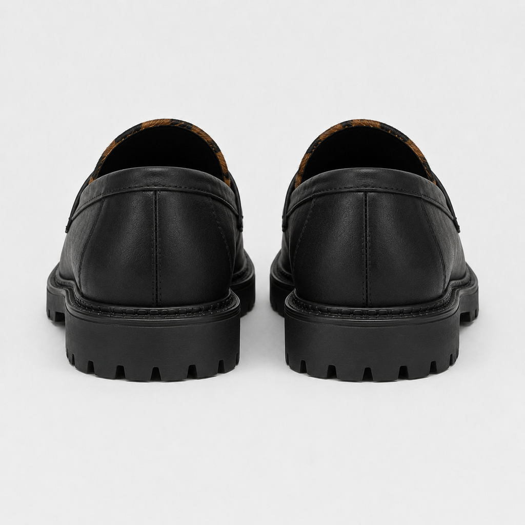 Back view of women's black platform loafers with chunky sole