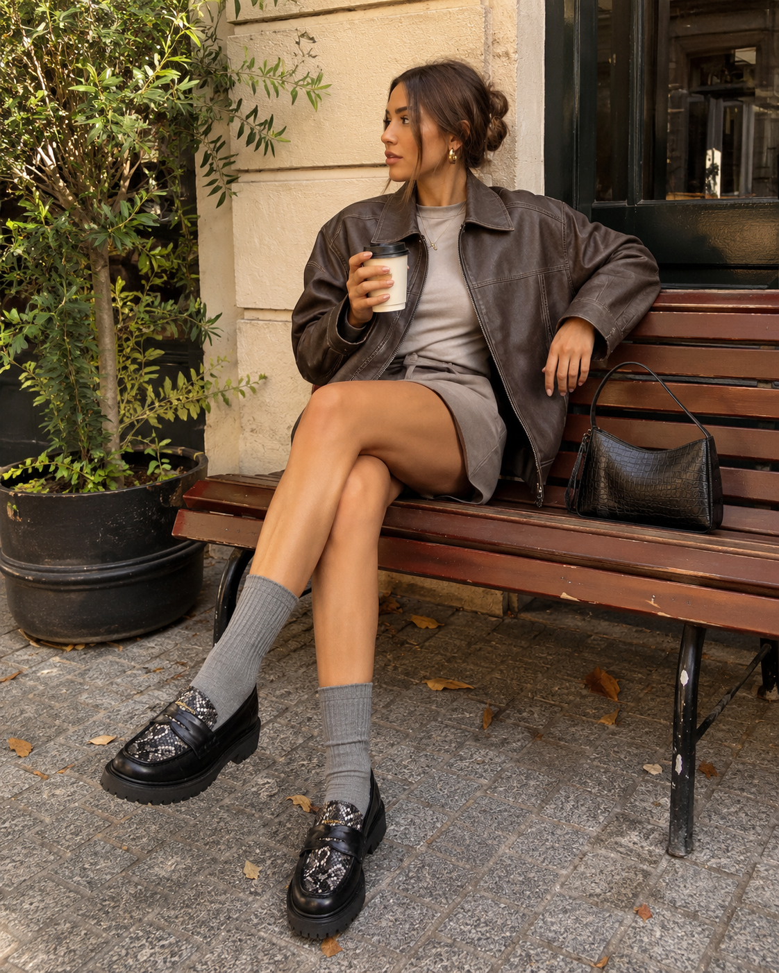 Women's platform loafers styled with skirt and socks