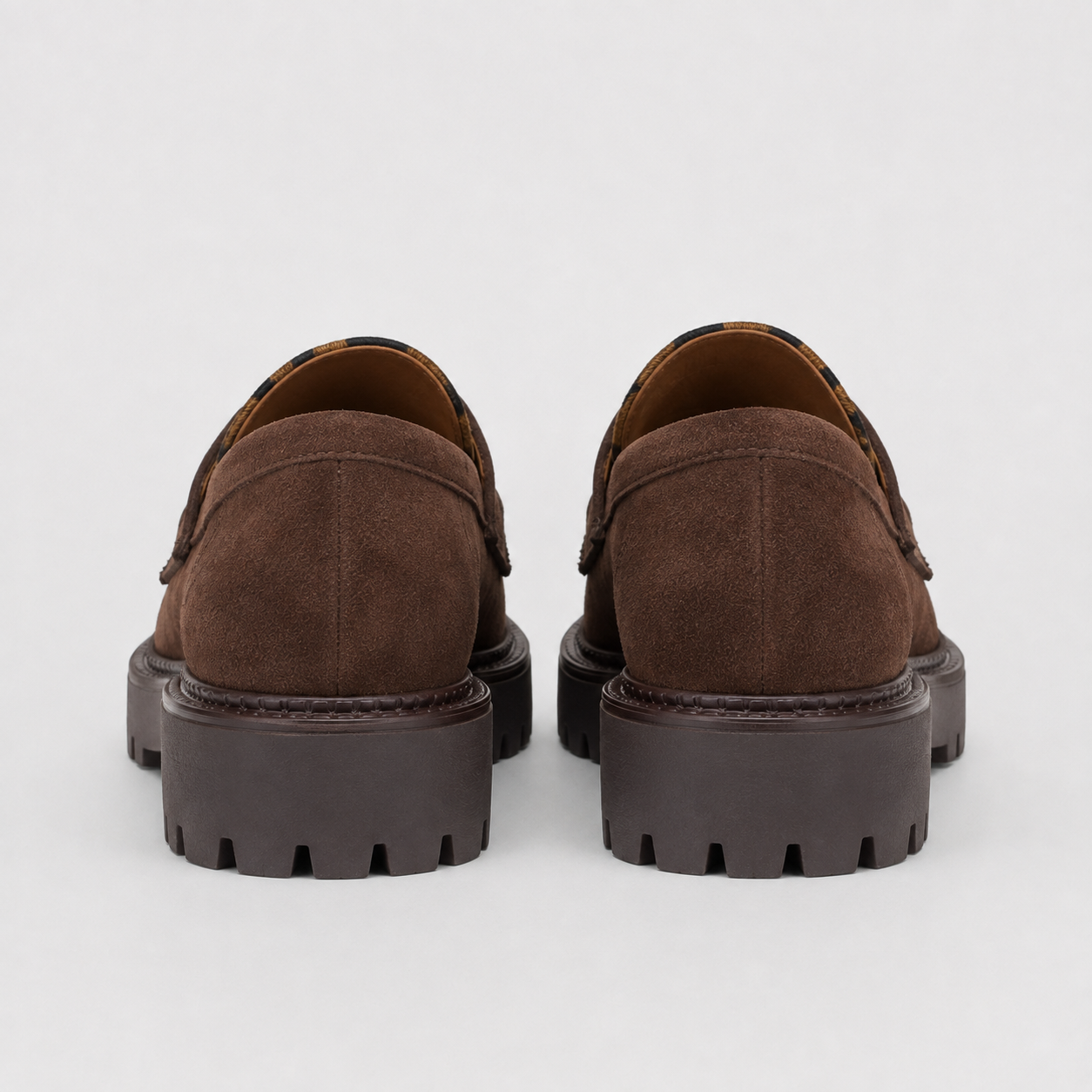 Brown leopard platform loafer with chunky lug sole, profile view