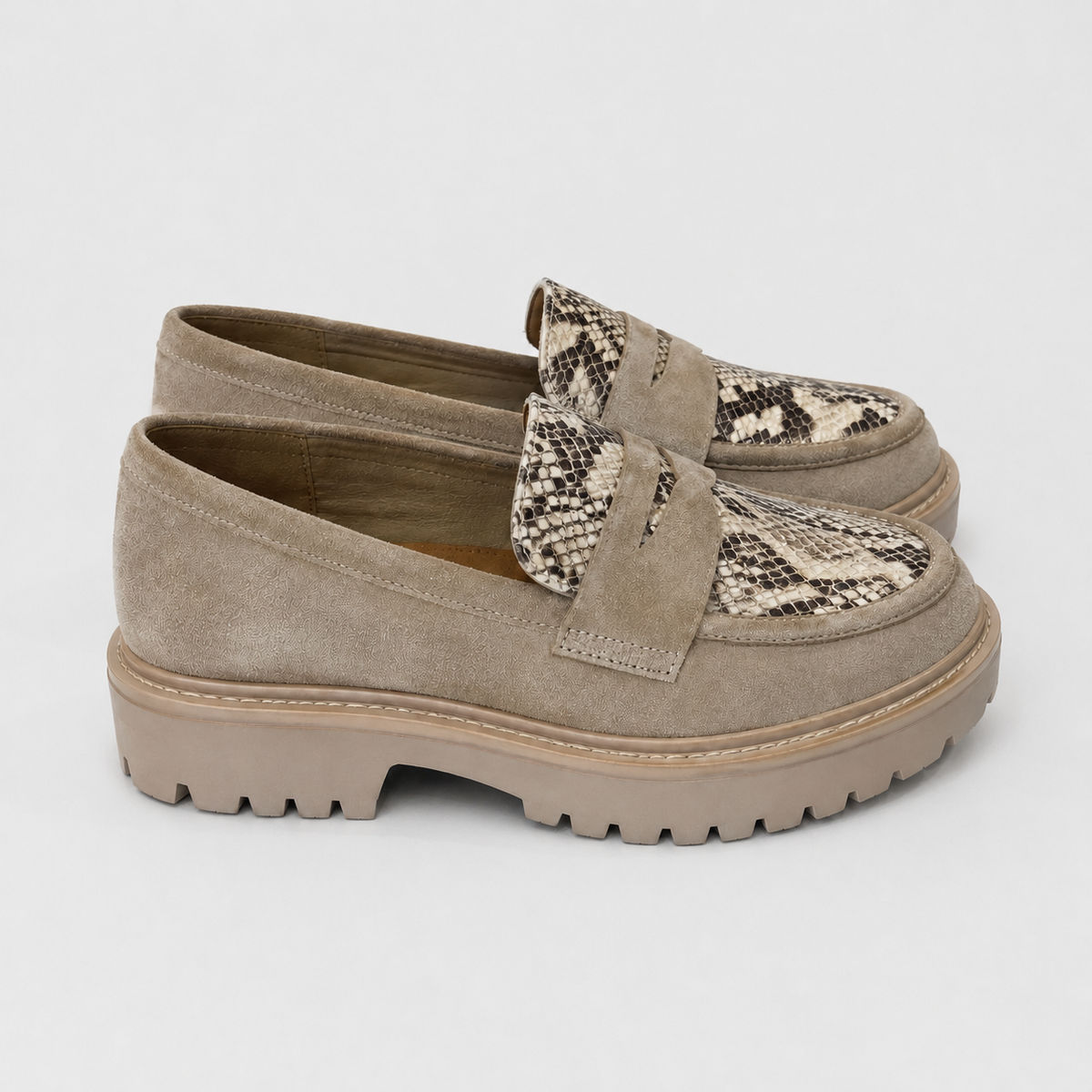 Beige snakeskin platform loafers for women with chunky lug sole, side view